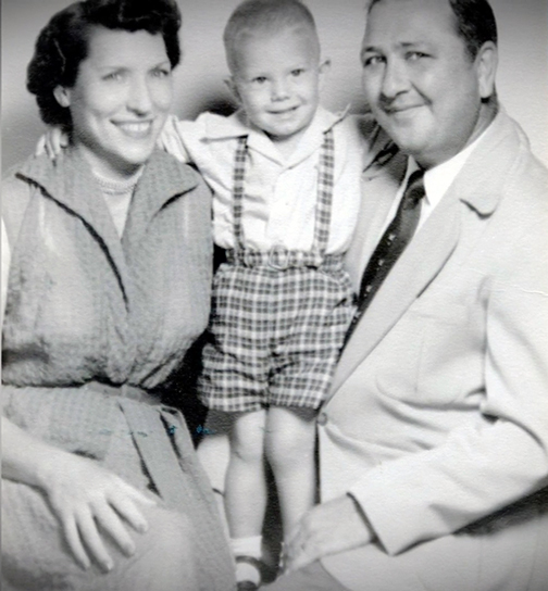 Henry Gremillion with his parents
